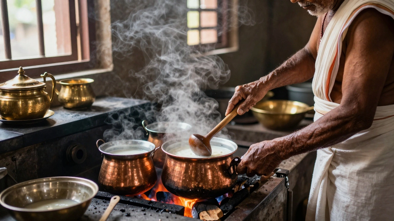 Tamil Nadu temple kitchen cooking Payasam in copper pots over wood fire.